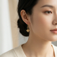 Obidome Gold-Plated Dangle Earrings